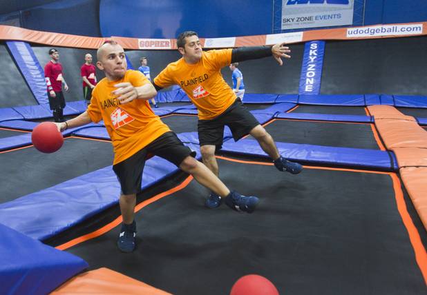 Plainfield (Ind.) teammates Wade Norton, left, and Andy Lang stay warm between matches during the 2013 Ultimate Dodgeball Championship at SkyZone Las Vegas Trampoline Park, 7440 Dean Martin Drive, on Sunday, Sept. 22, 2013. 