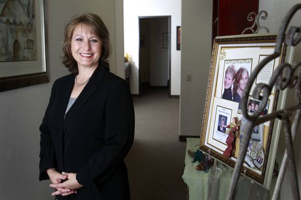 Allison Copening, founder and CEO of Seasons Funeral Planning Services, poses in the company offices Monday, Sept. 23, 2013. The service primarily assists individuals and families with decisions related to managing funerals. Copening is a former Nevada state senator.