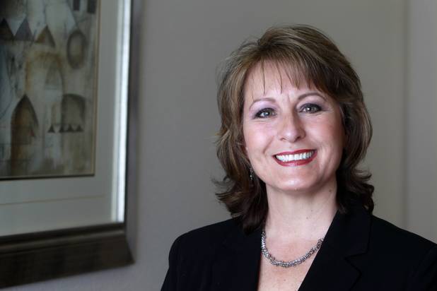 Allison Copening, founder and CEO of Seasons Funeral Planning Services, poses in the company offices Monday, Sept. 23, 2013. The service primarily assists individuals and families with decisions related to managing funerals. Copening is a former Nevada state senator.