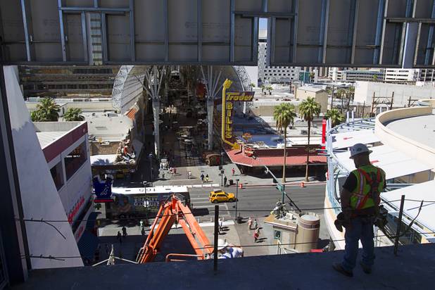 Construction continues on the SlotZilla lower zipline in downtown Las Vegas Monday, Sept. 23, 2013. The take-off tower is an 128-foot tall, 12-story slot machine-themed platform. The $11.5 million attraction is expected to open later this year.