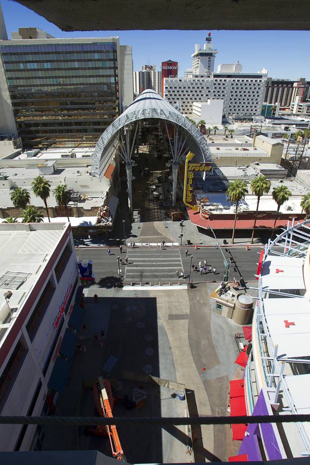 A view from the SlotZilla upper "zoomline"  platform under construction in downtown Las Vegas Monday, Sept. 23, 2013. Riders on the upper zoomline, 1,750 feet long, will be propelled from the tower at 35 mph. The take-off tower is an 128-foot tall, 12-story slot machine-themed platform. The $11.5 million attraction is expected to open later this year.