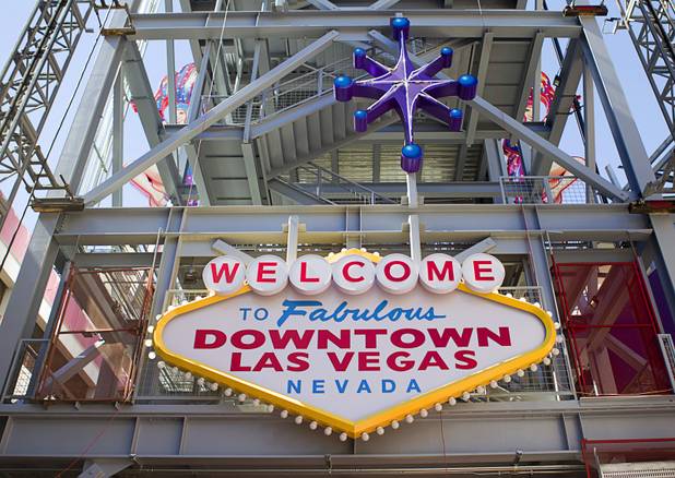 The SlotZilla zipline is shown under construction in downtown Las Vegas Monday, Sept. 23, 2013. The take-off tower is an 128-foot tall, 12-story slot machine-themed platform. The $11.5 million attraction is expected to open later this year.
