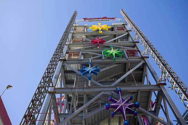 The SlotZilla zipline is shown under construction in downtown Las Vegas Monday, Sept. 23, 2013. The take-off tower is an 128-foot tall, 12-story slot machine-themed platform. The $11.5 million attraction is expected to open later this year.