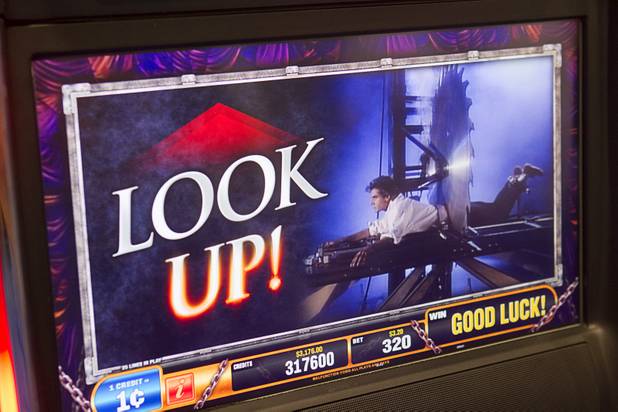 A screen is shown from a video slot machine themed after the magic of David Copperfield during the G2E convention at the Sands Expo Center Tuesday, Sept. 24, 2013.  