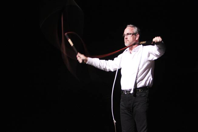 Chris Camp from Springfield, Illinois breaks the sound barrier with his whips during his performance at the Station to Station event at The Skyline Drive-In Theater in Barstow, Calif., Sept. 24, 2013. He and his family are frequently asked to perform at events across the country.