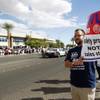 Over 300 members of the Transit Workers Union, in town for their convention, picket outside of Allegiant Air headquarters Thursday, Sept. 26, 2013. The union members were trying to raise awareness of Allegiant's customer service record as well as their inability to reach a labor agreement with more than 600 of their flight attendants.