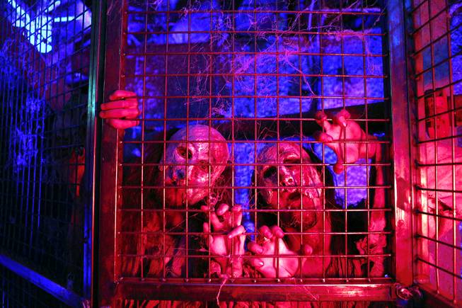 Actors Josh Bozarth and Nick Loeks play sick people inside Fright Dome at Circus Circus in Las Vegas on Thursday, Sept. 26, 2013.