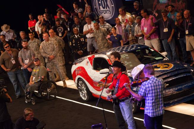 Clay Walker performs during the 2013 Barrett-Jackson Collector Car Auction ...