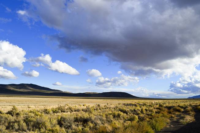 Clouds move over northern Nevada near the intersection of U.S. 93 and Interstate 80, east of Elko, on Sept. 25, 2013.