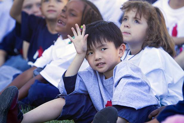 Rickie Pham, 5, waits to ask a question during a presentation about health and nutrition at the Boys and Girls Club, 2980 Robindale Rd., in Henderson Monday, Sept. 30, 2013. Bodies: The Exhibition," currently at the Luxor, and the Boys and Girls Club teamed up to install a childrens vegetable garden at the club as part of Septembers National Childhood Obesity Awareness Month.