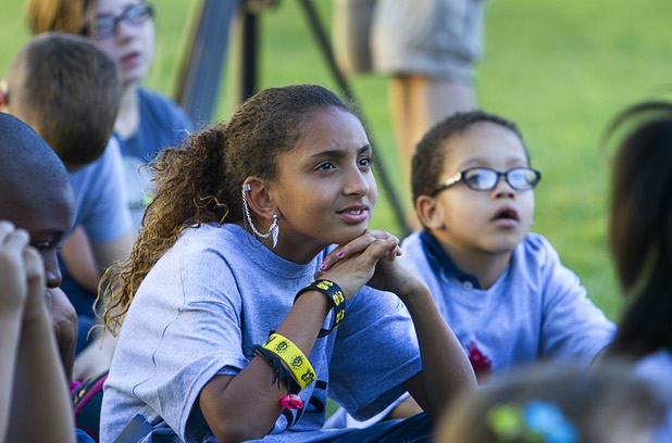 Jazmine Fells, left listens to Dr. Roy Glover, medical director of Bodies: The Exhibition," as he speaks on health and nutrition at the Boys and Girls Club, 2980 Robindale Rd., in Henderson Monday, Sept. 30, 2013. Bodies, currently at the Luxor, and the Boys and Girls Club teamed up to install a childrens vegetable garden at the club as part of Septembers National Childhood Obesity Awareness Month.