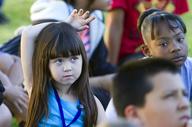 Jenelly Valencia, left, 5, waits to ask a question during a presentation about health and nutrition at the Boys and Girls Club, 2980 Robindale Rd., in Henderson Monday, Sept. 30, 2013. Bodies: The Exhibition," currently at the Luxor, and the Boys and Girls Club teamed up to install a childrens vegetable garden at the club as part of Septembers National Childhood Obesity Awareness Month.