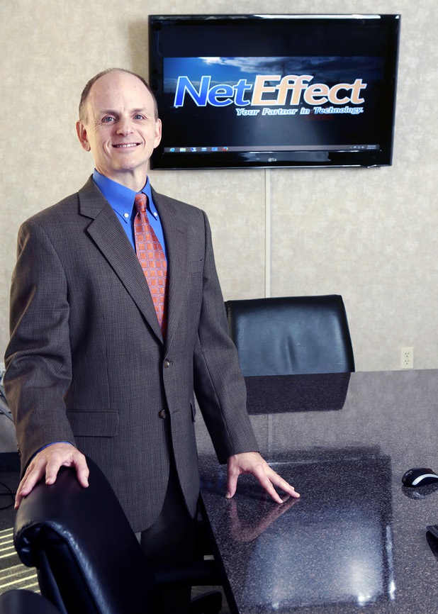 Jeff Grace, president/CEO of NetEffect, poses in the company conference room Monday, Sept. 30, 2013. The Las Vegas company provides remote managed IT services, cloud computing, an information technology consulting service, and offsite data backup and recovery services.