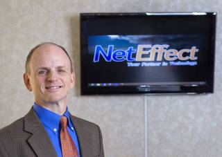 Jeff Grace, president/CEO of NetEffect, poses in the company conference room Monday, Sept. 30, 2013. The Las Vegas company provides remote managed IT services, cloud computing, an information technology consulting service, and offsite data backup and recovery services.