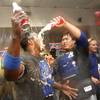 Los Angeles Dodgers' Hyun-Jin Ryu, of South Korea, right, celebrates with Yasiel Puig after their win over the Arizona Diamondbacks after a baseball game, Thursday, Sept. 19, 2013, in Phoenix. The Dodgers clinched the N.L. West with their 7-6 win over the Diamondbacks.