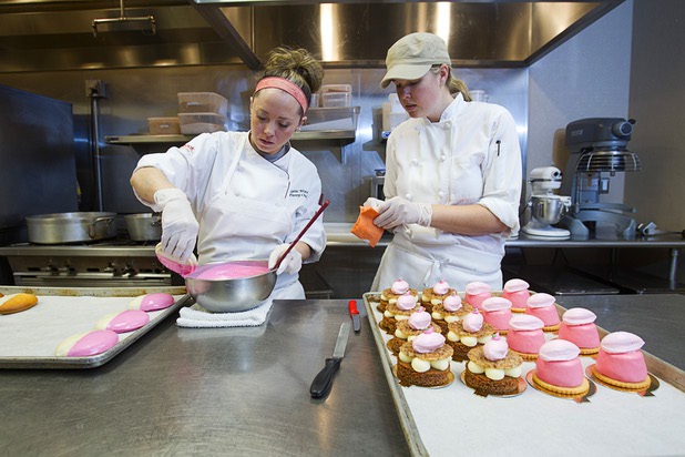 Pastry chefs Katie Ward, left, and Megan Hirdman create pink pastries and cakes at the Red Rock Resort bakery Tuesday, Oct. 1, 2013. Station Casinos is hosting its fourth annual "Project Pink" initiative for National Breast Cancer Awareness Month. Throughout October, the majority of station properties will donate a portion of its proceeds from Project Pink retail sales and Pink gaming winnings to the Southern Nevada affiliate of Susan G. Komen, an organization supporting breast cancer research.
