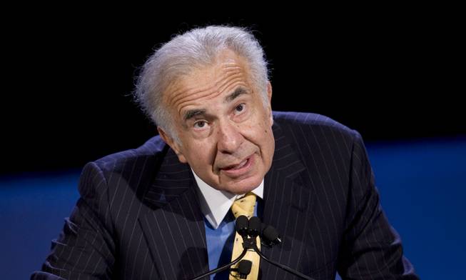  In this Oct. 11, 2007, file photo, private equity investor Carl Icahn speaks at the World Business Forum in New York.