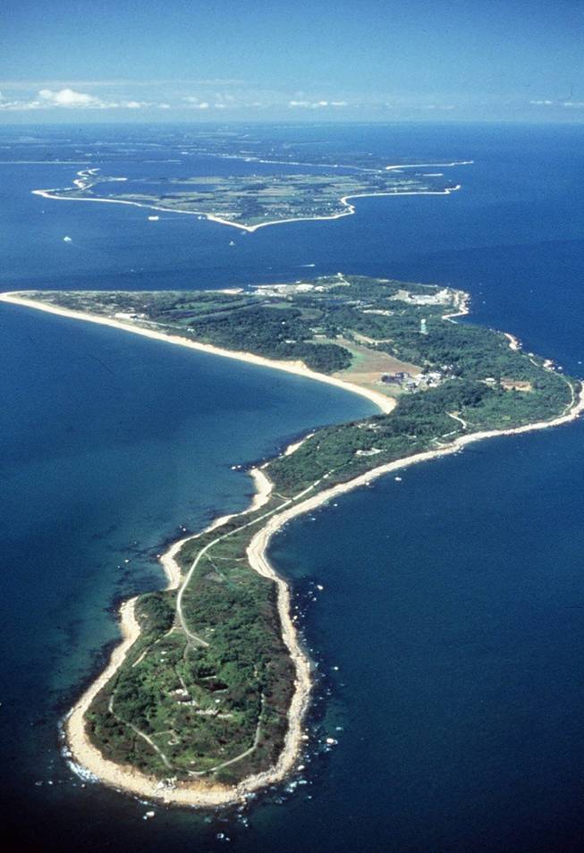 In this undated file photo provided by the U.S. Department of Agriculture, Plum Island is seen from the air in the waters off the northern shore of New York’s Long Island. On Tuesday, June 25, 2013, the General Services Administration stated that it was moving ahead with plans to sell the island and the animal research lab that has operated there since the 1950s. 