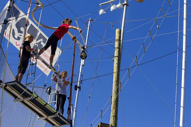 Terry Cavaretta-St.Jules, 60, center, owner of Terry Cavaretta Trapeze Experience practices at the Las Vegas Sports Park, 1400 N. Rampart Blvd., Wednesday, Oct. 2, 2013. The Trapeze Experience will celebrate their grand opening at the Sports Park Friday, Oct. 4. There will be a free show, open to the public, from 4 p.m. to 6 p.m.