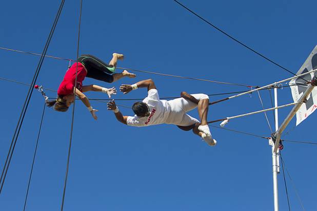 Terry Cavaretta-St.Jules, 60, owner of Terry Cavaretta Trapeze Experience practices with catcher Izzie Yaakub, 33, at the Las Vegas Sports Park, 1400 N. Rampart Blvd., Wednesday, Oct. 2, 2013. The Trapeze Experience will celebrate their grand opening at the Sports Park Friday, Oct. 4. There will be a free show, open to the public, from 4 p.m. to 6 p.m.