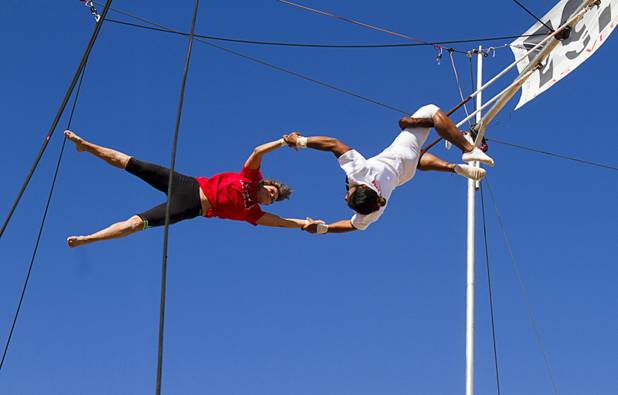 Terry Cavaretta-St.Jules, 60, owner of Terry Cavaretta Trapeze Experience practices with catcher Izzie Yaakub, 33, at the Las Vegas Sports Park, 1400 N. Rampart Blvd., Wednesday, Oct. 2, 2013. The Trapeze Experience will celebrate their grand opening at the Sports Park Friday, Oct. 4. There will be a free show, open to the public, from 4 p.m. to 6 p.m.