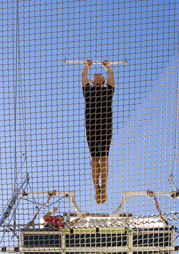 Taelyr Lazaris, 20, practices at the Terry Cavaretta Trapeze Experience, 1400 N. Rampart Blvd., Wednesday, Oct. 2, 2013. The Trapeze Experience will celebrate their grand opening at the Las Vegas Sports Park Friday, Oct. 4. There will be a free show, open to the public, from 4 p.m. to 6 p.m.