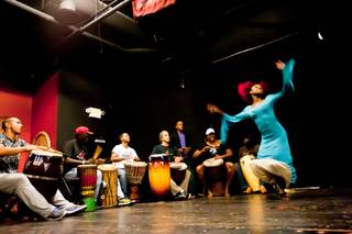 Musicians play for Producer Wassa Coulibaly while she dances during rehearsal of 