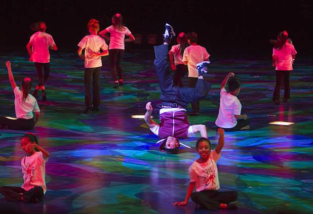 Cirque du Soleil artist Youssef El Toufali performs with Future Dance Scholars in "Shine Bright," choreography by Terane Comito, during "A Choreographers' Showcase," a presentation by the Nevada Ballet Theatre and Cirque du Soleil in the Mystere Theatre at the Treasure Island Sunday, Oct. 6, 2013. Another performance is scheduled for October 13.