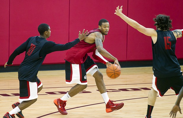 Bryce Dejean-Jones. center, passes the ball during the first UNLV basketball practice of the season at UNLV's Mendenhall Center Monday, Oct. 7, 2013.