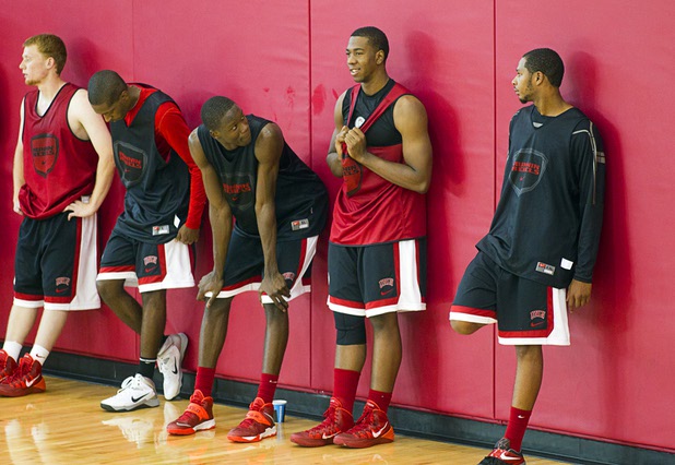 Players take a breather during the first UNLV basketball practice of the season at UNLV's Mendenhall Center Monday, Oct. 7, 2013.