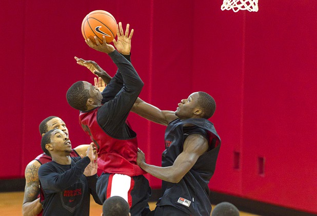 Deville Smith, left, takes a shot over Demetris Morant during the first UNLV basketball practice of the season at UNLV's Mendenhall Center Monday, Oct. 7, 2013.