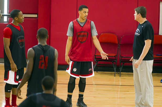 Kendall Smith, left, talks with Head Coach Dave Rice during the first UNLV basketball practice of the season at UNLV's Mendenhall Center Monday, Oct. 7, 2013.