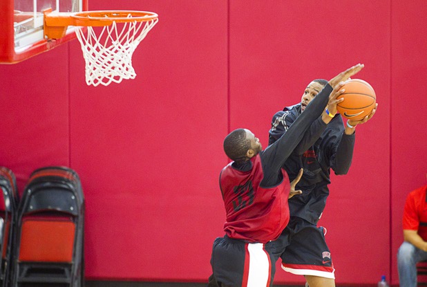 Deville Smith, left, defends against Jelan Kendrick during the first UNLV basketball practice of the season at UNLV's Mendenhall Center Monday, Oct. 7, 2013.