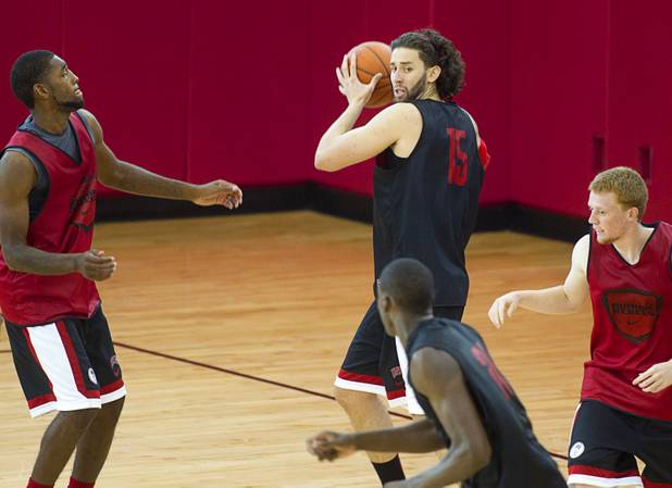 Carlos Lopez-Sosa prepares to pass after a rebound during the first UNLV basketball practice of the season at UNLV's Mendenhall Center Monday, Oct. 7, 2013.