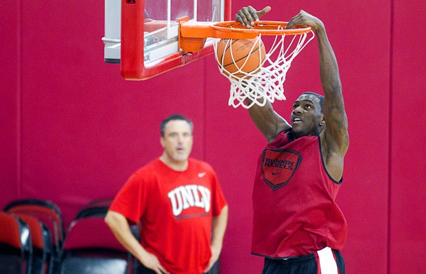 Savon Goodman dunks during the first UNLV basketball practice of the season at UNLV's Mendenhall Center Monday, Oct. 7, 2013.