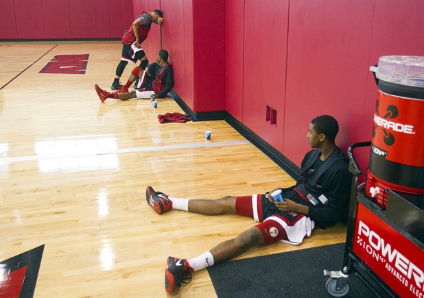 Players take a break after the first UNLV basketball practice of the season at UNLV's Mendenhall Center Monday, Oct. 7, 2013.
