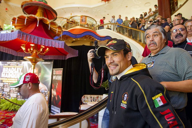Mexican boxer Juan Manuel Marquez arrives for interviews at the Wynn Las Vegas Resort Tuesday, Oct. 8, 2013. Marquez will challenge undefeated WBO welterweight champion Timothy Bradley Jr. at the Thomas & Mack Center Saturday.