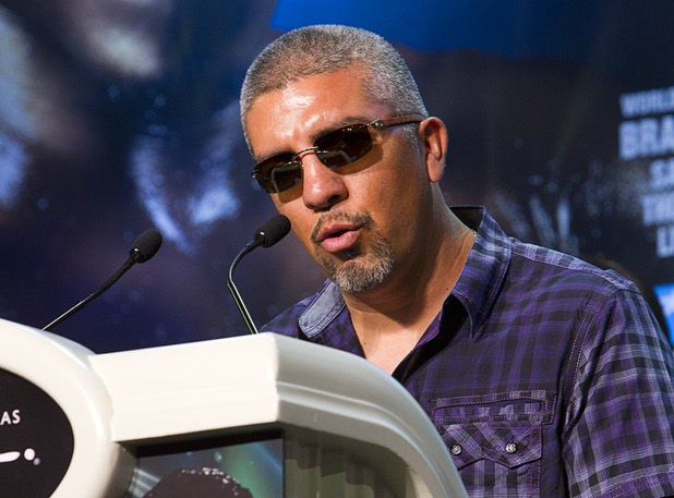 Joel Diaz, trainer for undefeated WBO welterweight champion Timothy Bradley Jr., speaks during a news conference at the Wynn Las Vegas Resort Wednesday, Oct. 9, 2013. Bradley will defend his title against Juan Manuel Marquez of Mexico at the Thomas & Mack Center Saturday.