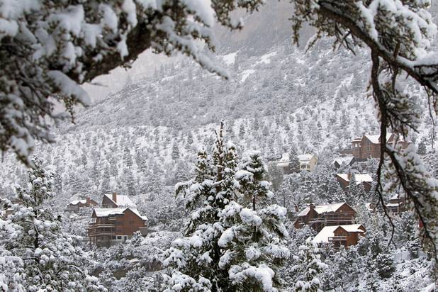 A view of snow-covered homes in the Echo Canyon subdivision on Mt. Charleston Thursday, Oct. 10, 2013.