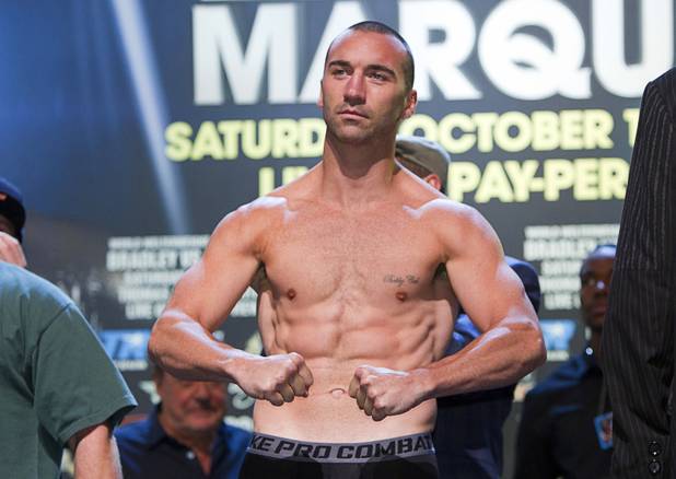 Sean Monaghan of New York poses during an official weigh-in at the Wynn Las Vegas Friday,, Oct. 11, 2013.  Monaghan, an Irish-American boxer, will face Anthony Smith of Pennsylvania in a light heavyweight bout at the Thomas & Mack Center on Saturday.