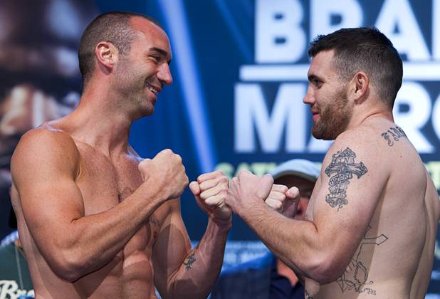 Boxers Sean Monaghan, left, of New York and Anthony Smith of Pennsylvania pose during an official weigh-in at the Wynn Las Vegas Friday,, Oct. 11, 2013.  The boxers will meet in a light heavyweight bout at the Thomas & Mack Center on Saturday.