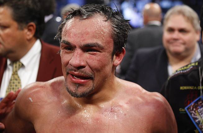 Juan Manuel Marquez of Mexico stands in the rings after going 12 rounds with WBO welterweight champion Timothy Bradley Jr. at the Thomas & Mack Center Saturday, Oct. 12, 2013. Bradley won by split decision.