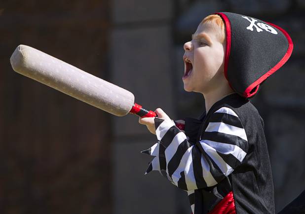 Ryan Helman, 3 , practices a yell as he volunteers in the Nature of Mercy comedy sword show during the Age of Chivalry Renaissance Festival at Sunset Park Sunday, Oct. 13, 2013.
