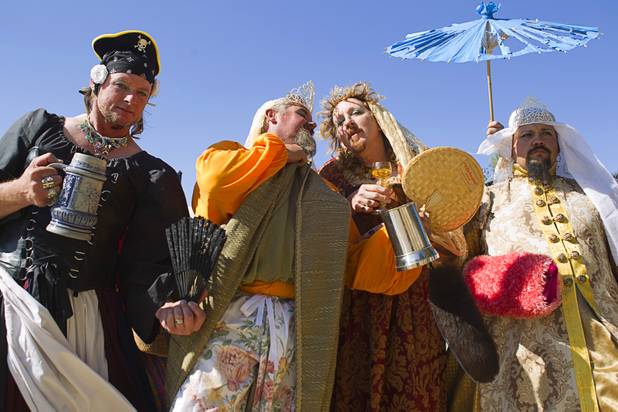Princesses of Vulgarity, from left, Cornelius Von Lickteinstein, Carmella Nougat, Coco Marzipan, and Chum Brulee pose during the Age of Chivalry Renaissance Festival at Sunset Park Sunday, Oct. 13, 2013.