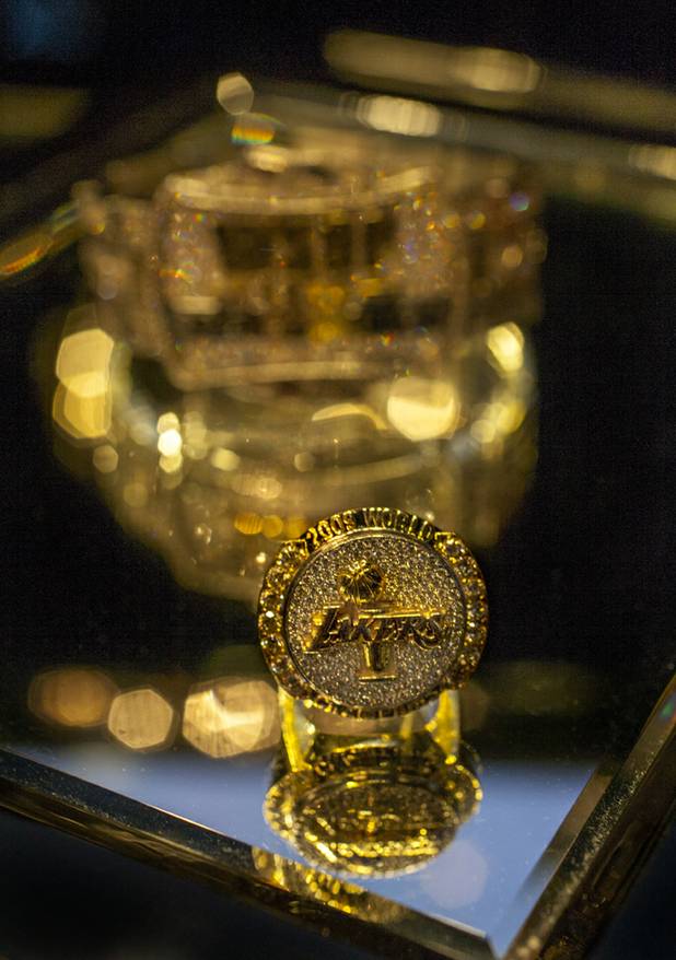 A 2009 Los Angeles Lakers championship ring and the $500,000 2013 World Series of Poker championship bracelet both designed by Jason Arasheben of Jason of Beverly Hills on display in his shop in the Cosmopolitan on Thursday, Oct. 10, 2013.