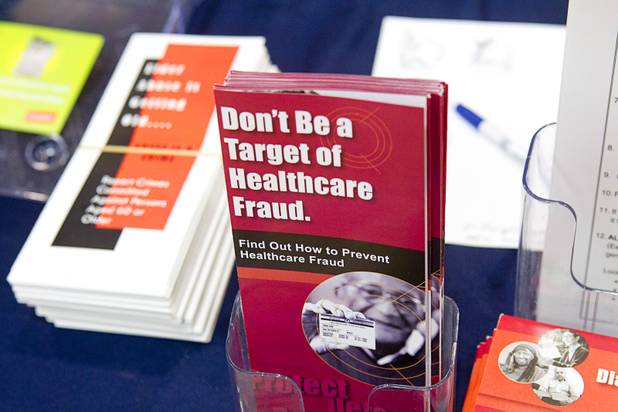 Information on healthcare fraud is displayed on a Nevada Senior Medical Patrol (SMP) table during a senior safety fair at the East Las Vegas Community Center, 250 North Eastern Ave., Tuesday, Oct. 15, 2013.  SMP educates Nevadans on how to detect and report healthcare fraud in Medicare and Medicaid.