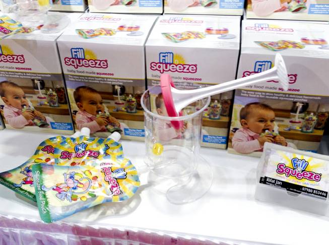 The Fill 'n Squeeze system developed by Rifat Jan from Great Britain at the ABC Kids Expo at the Las Vegas Convention Center, Tuesday, Oct. 15, 2013.