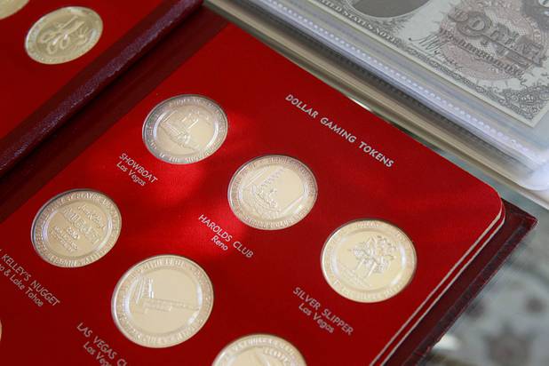 A 1965 collection of silver casino gaming tokens from the Franklin Mint, part of Steve Cutler's collection of Las Vegas memorabilia, is displayed at Cutler's home Wednesday, Oct. 16, 2013. Cutler, founder of Casino Legends Hall of Fame, used to display his collection in a museum at the Tropicana but is now looking for a new way to display the collection.