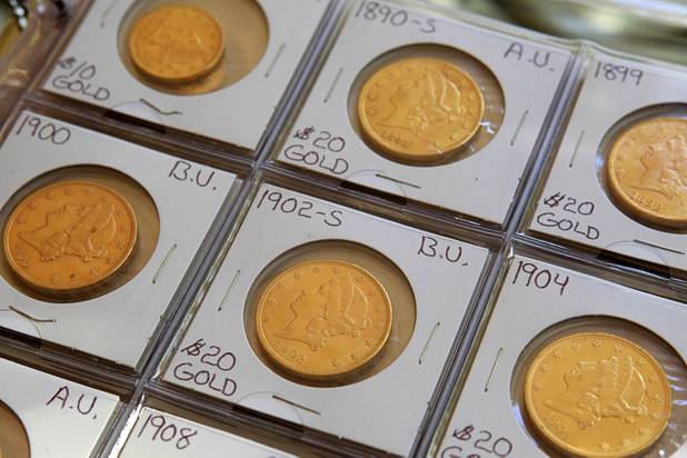 Gold $20 Liberty coins, part of Steve Cutler's collection of Las Vegas memorabilia, are displayed at Cutler's home Wednesday, Oct. 16, 2013. Cutler, founder of Casino Legends Hall of Fame, used to display his collection in a museum at the Tropicana but is now looking for a new way to display the collection.
