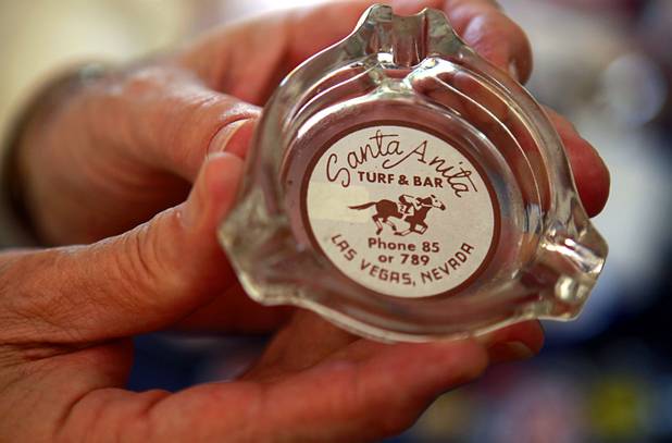 An ashtray from the Santa Anita Turf & Bar, part of Steve Cutler's collection of Las Vegas memorabilia, is shown at Cutler's home Wednesday, Oct. 16, 2013. Note that the phone number is just two or three numbers. Cutler, founder of Casino Legends Hall of Fame, used to display his collection in a museum at the Tropicana but is now looking for a new way to display the collection.